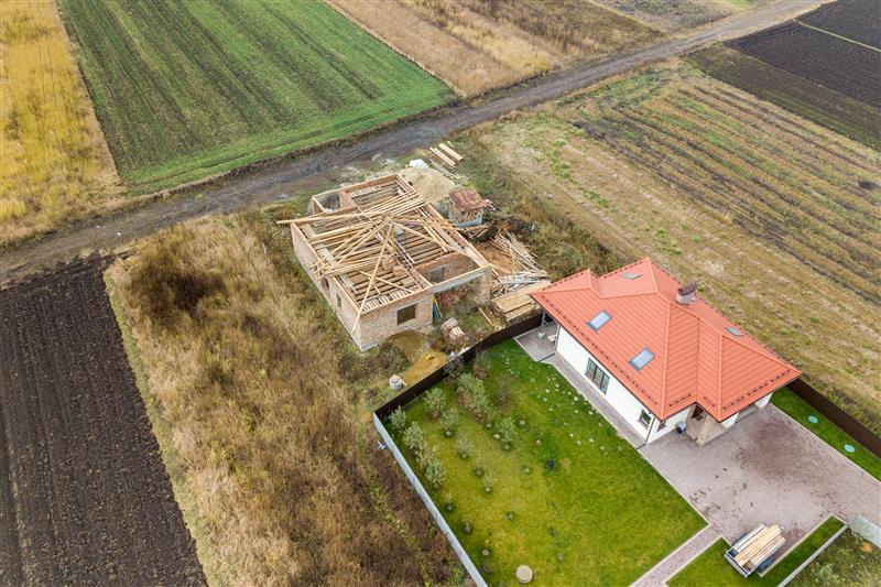 top-down-aerial-view-of-two-private-houses-2024-12-06-04-05-34-utc